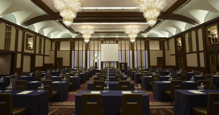 Dark coloured conference room at Hotel Hankyu International Osaka with classroom seating style