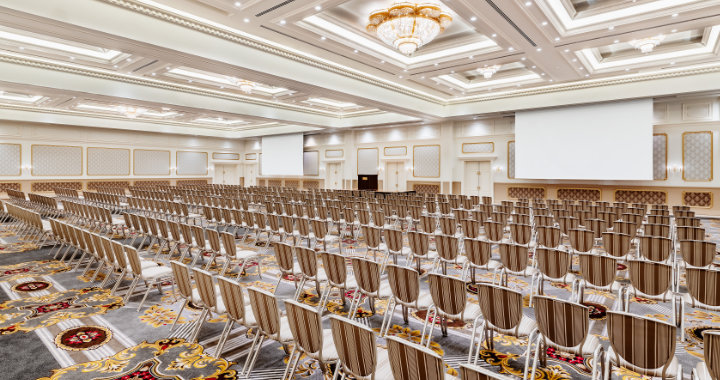 Elegant event space 'Houju' in light white colours at Takarazuka Hotel in Hyogo with theater style seating