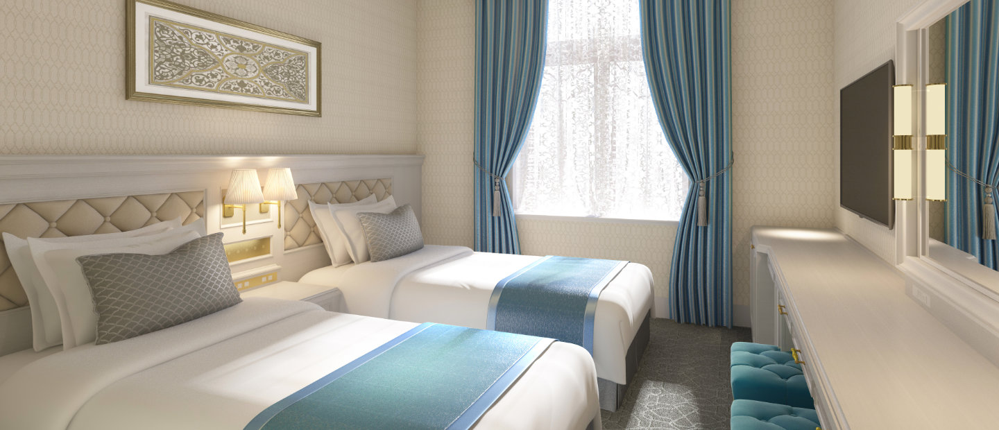 白と青のアクセントカラーでエレガントなヨーロピアンな雰囲気の宝塚ホテルの客室